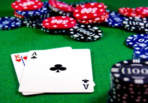 Some cards and chips for blackjack