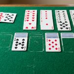 Solitaire daily game illustration for AARP Games Solitaire